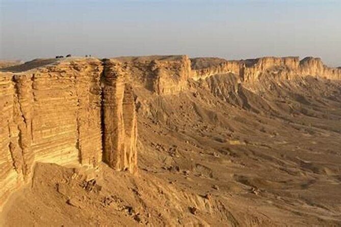 Edge of the World Tour - Tuwaiq Escarpment: ocean-bed clues, dried rivers, and camels far below
